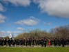 Graduates of Vermont Technical College line up as they process to the outdoor ceremony on the Randolph Center campus.