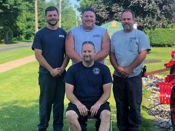 Shawn Bull with heroic co-workers Ronald Moser, Richard Daugherty and Denis Giroux.