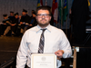 Nicholas Romei receives the Outstanding Achievement in Management Studies Award during American International College's Academic Achievement Awards ceremony.