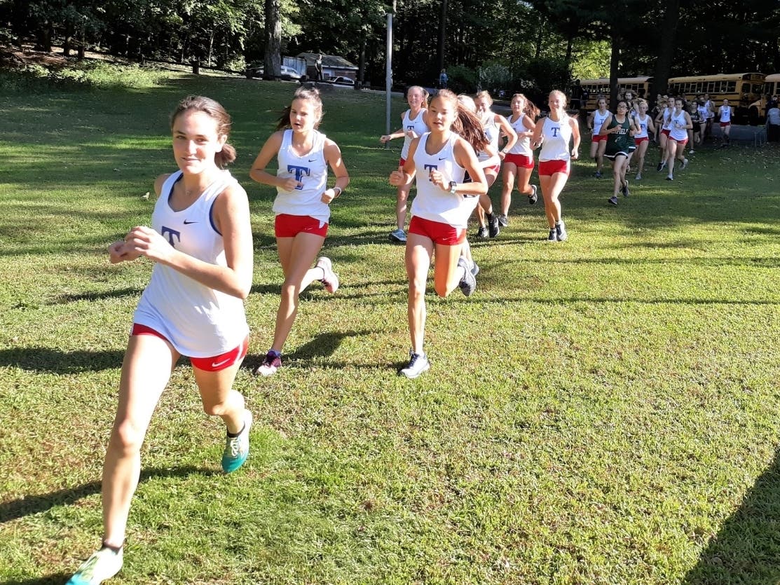 Tolland posted victories over Enfield and East Catholic in girls cross country action Tuesday at Powder Hollow Park.