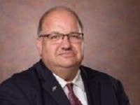 Board of Education chairman Walter Kruzel.