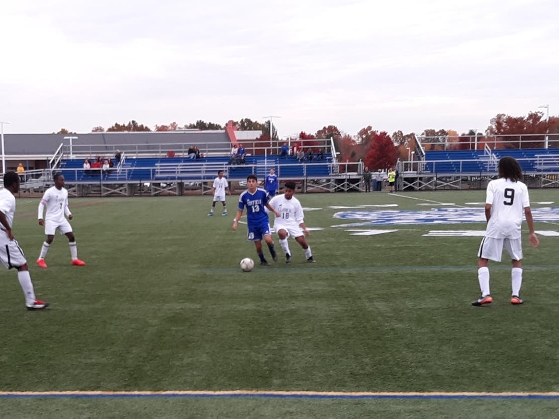 Suffield's Brendon Sorto is surrounded by four Classical Magnet defenders during soccer action Friday.