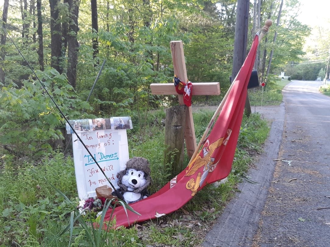 A memorial set up across from the Willington home of Theodore DeMers.