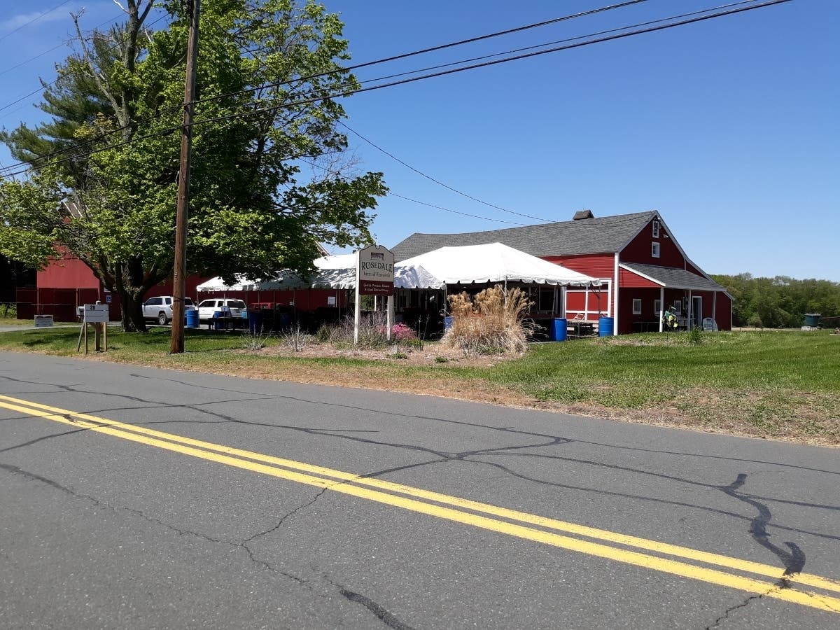 The view from East Weatogue Street doesn't tell the whole story of Rosedale Farms & Vineyards.