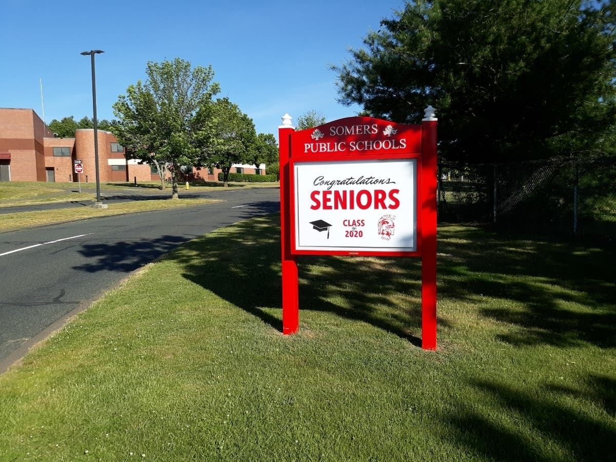 A total of 103 Spartans graduated Thursday in a ceremony at the Mansfield Drive-In Theatre.