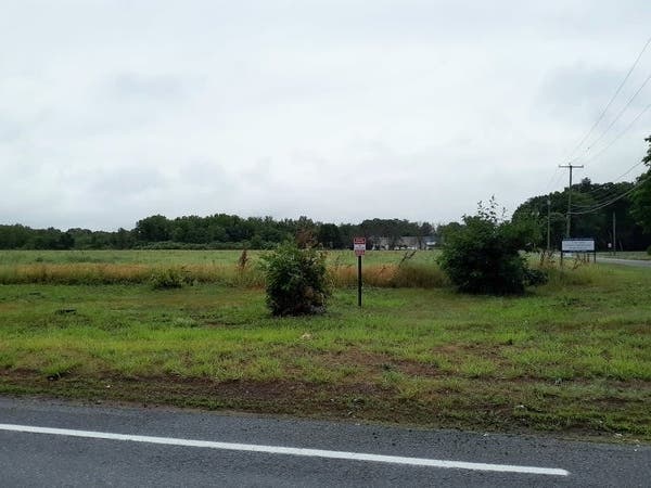 A 71-acre spread of former farmland on North Maple Street and Moody Road will be the site of a new industrial distribution center.