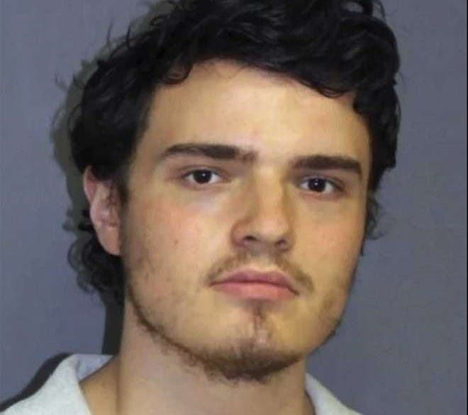 The suspect in a pair of grisly homicides appeared via video teleconference before a Rockville Superior Court judge Wednesday.