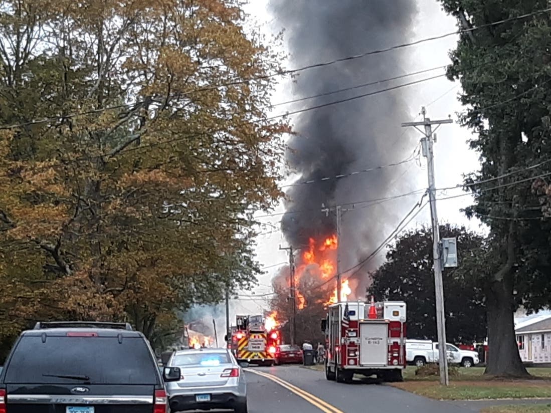 Fire companies from at least five towns assisted at a severe blaze at an Ellington horse stable Friday morning.