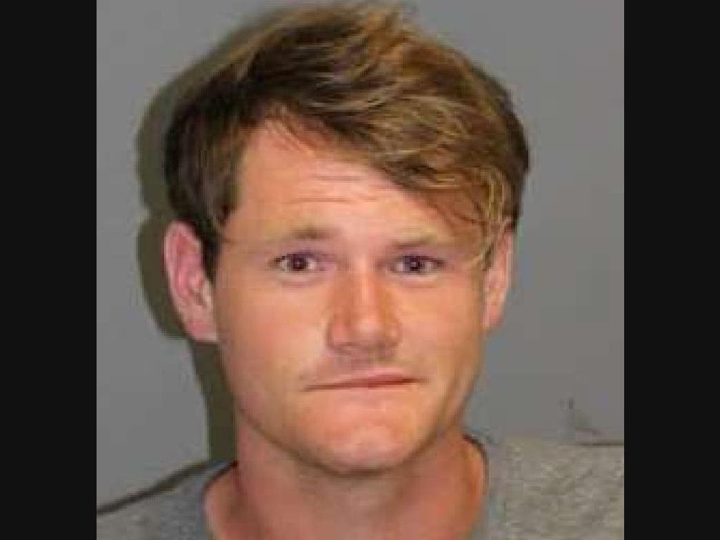 The state police booking photo of Spencer Kraus, 24, of Ellington.