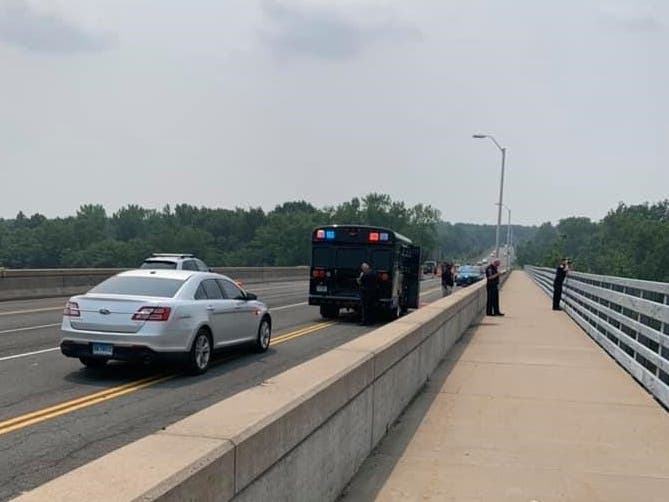 A person was reported to be in the Connecticut River a few miles upstream from the Enfield/Suffield Veterans Bridge in Agawam, Mass., according to a police captain.