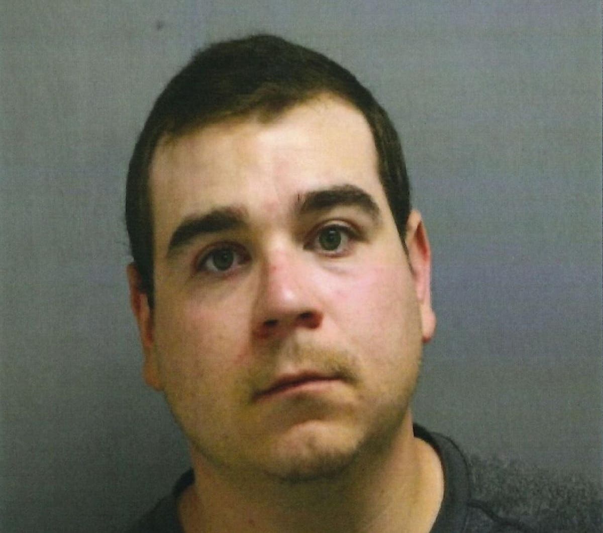 The police booking photo of Robert Jeffers, 26, who was charged Wednesday with first-degree illegal possession of child pornography.