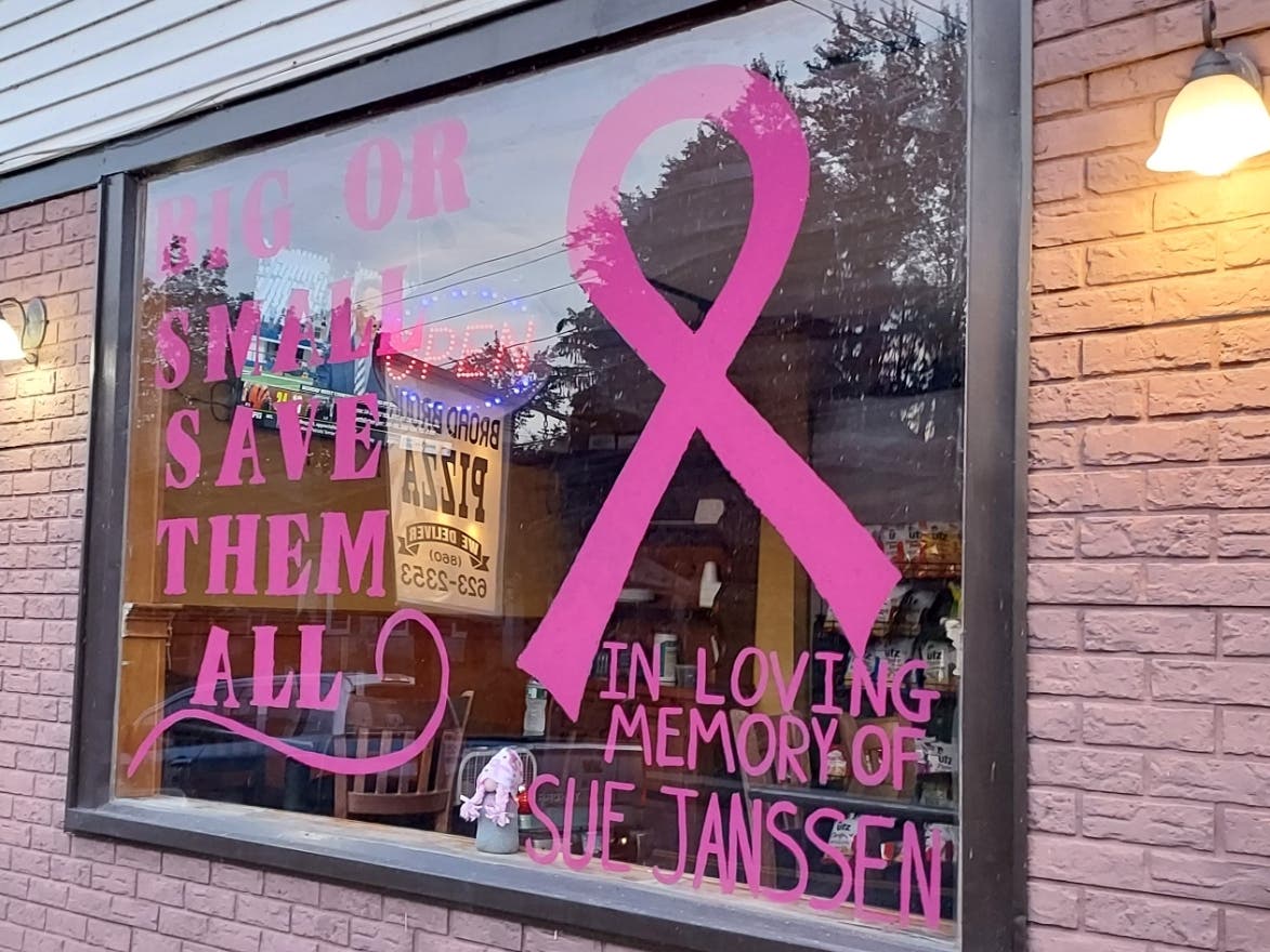 In memory of a longtime friend who died of breast cancer, Broad Brook Pizza owner Bob Miner will be assisting a needy family with the sale of custom-made T-shirts.