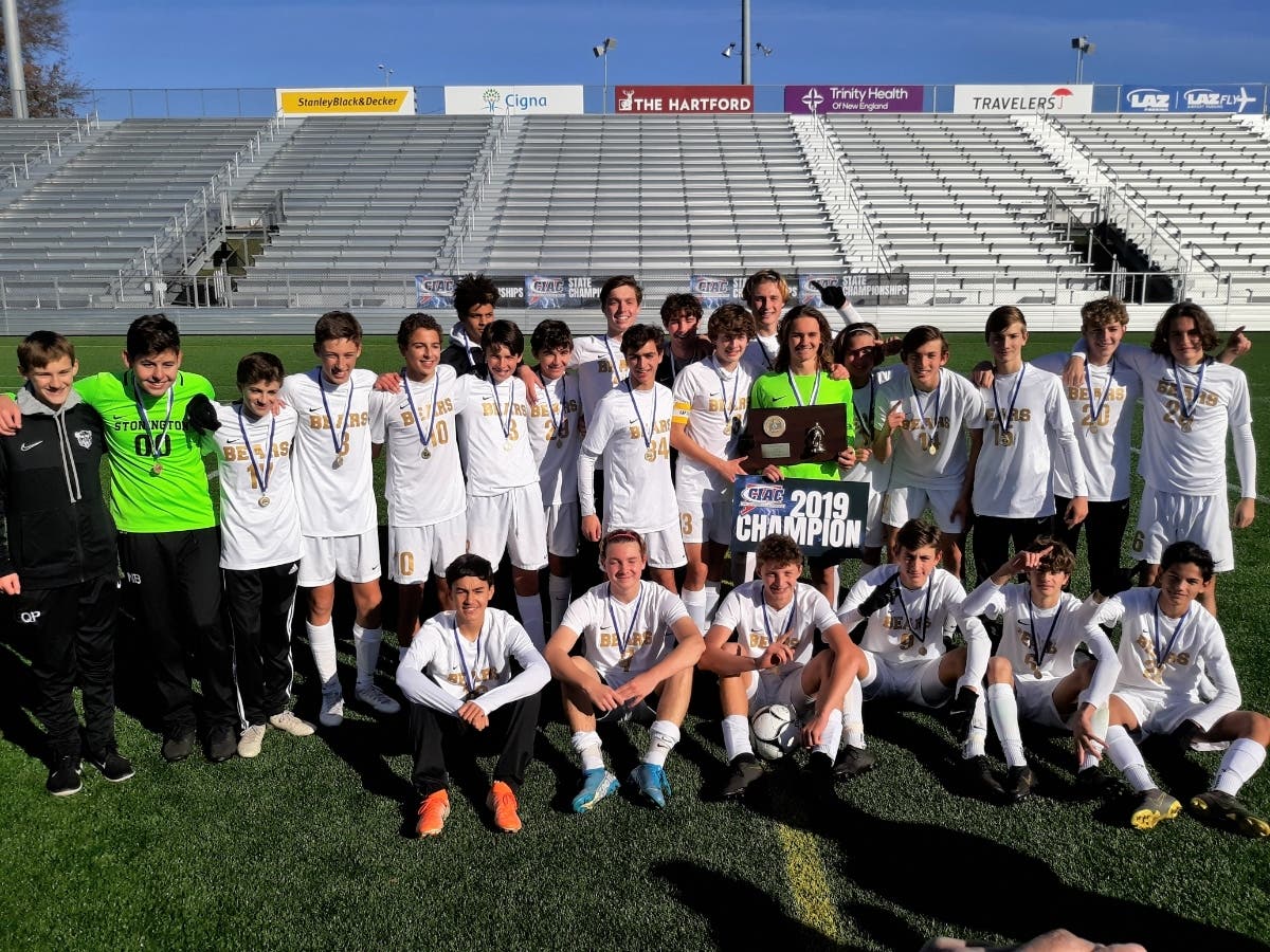 Stonington seeks to repeat its 2019 Class M boys soccer championship in a rematch with Ellington Saturday at Dillon Stadium in Hartford.
