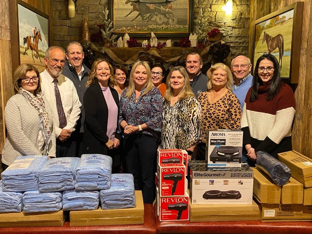 Board members of the Be The One Foundation and the Carol Rivest Memorial Foundation gathered Tuesday to provide goods and supplies to a pair of area domestic violence assistance agencies.