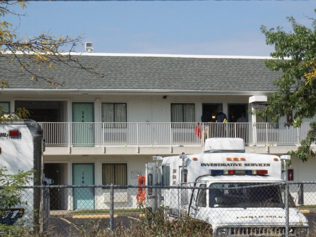 Emergency personnel dispatched to a report of "a fall" instead found a dead baby at the Motel 6 in Enfield, according to police.