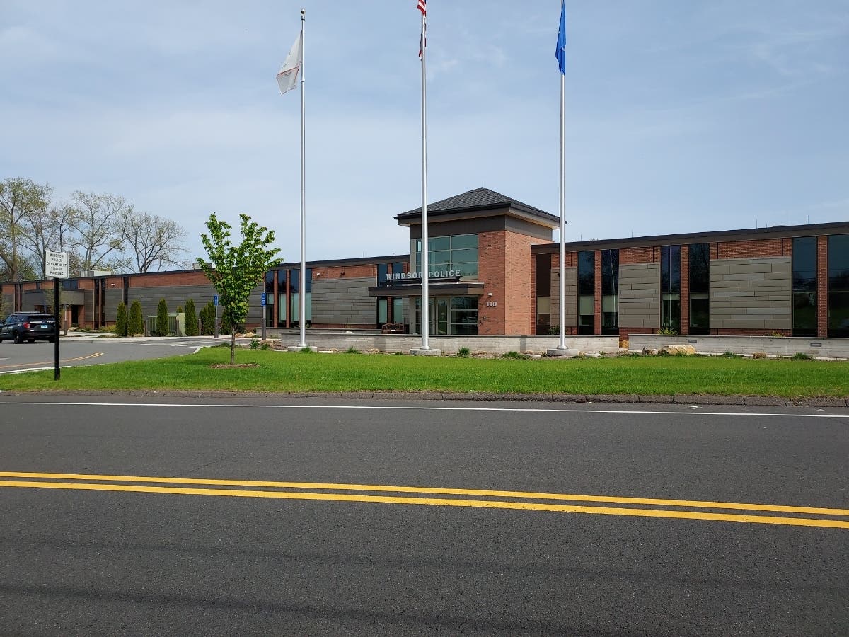 A man died after he apparently set fire to a garage on Maple Avenue where he had been involved in a standoff with Windsor police.