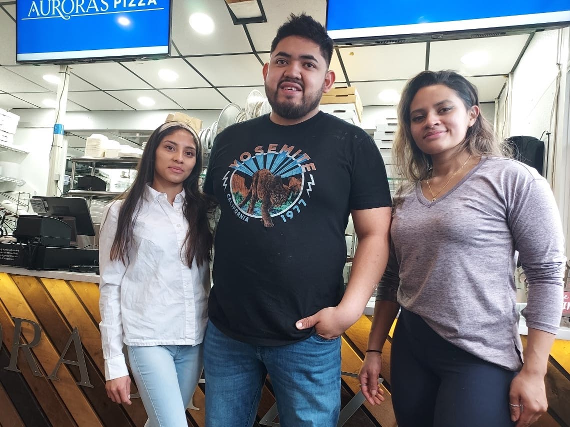 Aurora's Pizza owners Maria Aguilar, Hambler Olmino and Karen Valenzuela.