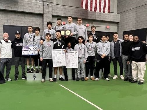 Xavier easily breezed to its second consecutive State Open wrestling crown.