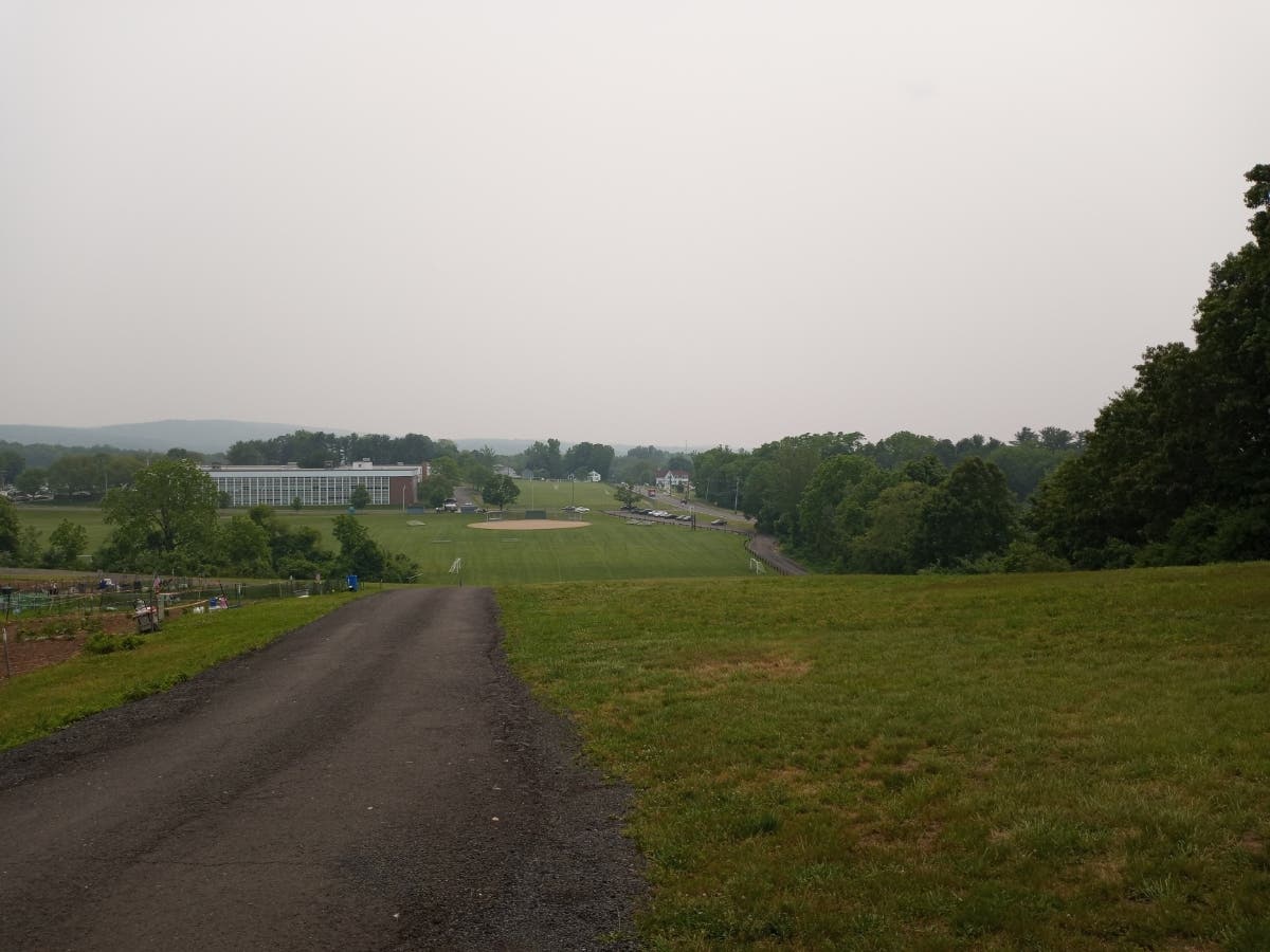 A haze brought on by wildfires out of Quebec lingers over Vernon Center Middle School.