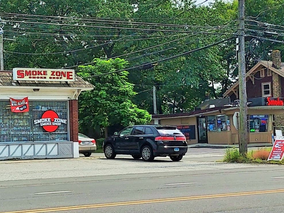 There are seven smoke shops in the first mile of Route 5 in Enfield, including these two side by side.