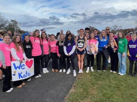 Girls individual champion Katie Bohlke of Newington High School with her "fan club."