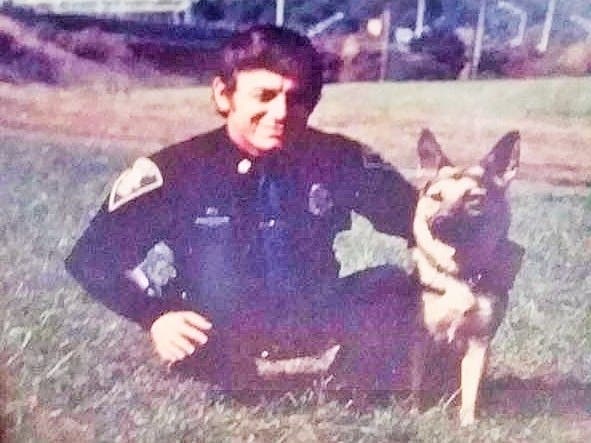Officer Tom Chagnon and his canine partner Satan in the early 1980s.