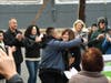 Mural Designer Diane Luger Moen and Artist Jason Diaz congratulate one another for a job very well done.
