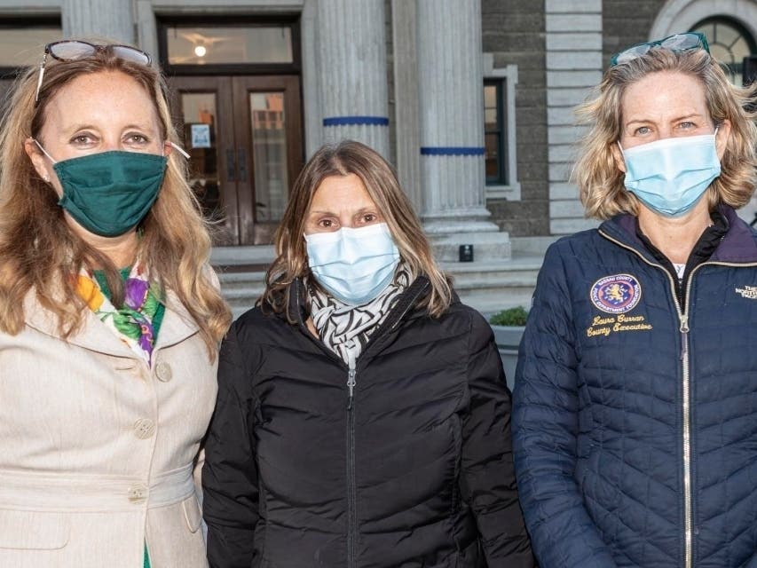 Legislator DeRiggi-Whitton and Nassau County Executive Laura Curran with Vivian Jepp, of Port Washington, outside the Theodore Roosevelt Executive and Legislative Building in Mineola on Thursday, April 26.