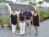 (From left) Port Washington Chamber of Commerce's Bobbie Polay, Nicholas Center and Spectrum Designs Stella Spanakos, Plant-a-Row's Marvin Makofsky, and  Legislator Delia DeRiggi- Whitton at Nicholas Center's greenhouse.