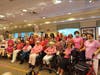 Juniper Village residents and members of Phi Theta Kappa from Bergen Community College  dress in pink to show their support for Breast Cancer Awareness Month. 