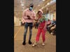 Juniper Village at Paramus resident walks the runway with support from BCC student in the Pink Out Fashion Show.