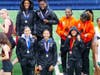 The Panthers (center, in the rain, with blue ribbons) took their fifth NCS title in six years last weekend.