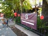 Campus neighbors and friends cheered on the families along the final block-long drive into the school campus.
