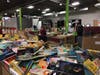 Bins of donated books will be sorted and packed for at-risk children throughout the Chicagoland area.