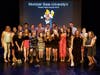 This Summit High School "Theatre Collective" of Peter and the Starcatcher with their award for Best Comedy Adaptation.
