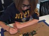 Seven-year-old Rowan Cashin is representing Cub Scout Pack 8 on June 29. 