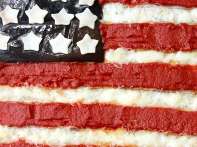 Outta Hand Pizza to reveal 9'by 4' flag siciliano pie on Saturday. 