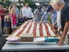 The world's largest flag siciliano pie was served to a hungry crowd in Westfield. 