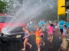 Annual visit provided local children a unique way to cool off. 