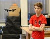 Edison 8th grader Caleb Wiggins observes a drone aloft, after programming its flight pattern during a popular course at STEM Camp in Westfield.