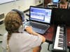 Campers learn how to score a film clip, composing their own music and sound effects during STEM Camp at Westfield Public Schools.