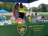 The annual event fought crime through community engagement with food, games and music designed to 'give crime a going away party.'