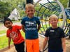 L-R McKinley 1st graders Yazid Merino and Mathew Perlak with 3rd grader Nikolai Filippov enjoy some playground time during the English Language Learners (ELL) Summer Experience.