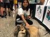 Allison Marcha with a therapy dog 