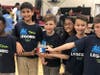 Wilson Wright, Neev Nedungadi, Luke Jenner, Mahie Panjwani, Evan Tukaczynski, and Aaron Rudnick compete as Team Legorio during the First Lego League qualifying round, advancing to the state championship on Dec 14-15.