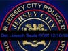 Officers from around Morris County share grief for Detective Joseph Seals, shot to death in the line of duty Tuesday.