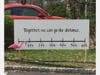 Gay Boyle and Mark Philhower have put up an inspirational sign and masked flamingo at their home near Parsippany High School. 