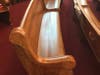 Church pews restored from previous church built in 1882.