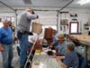 Once pronounced done, the apple butter is poured into a home-made four-gallon jar filler. The finished apple butter at this point is extremely hot – almost at the boiling point, so experience and extreme caution is a requirement for handling the jars.