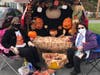 Church members host Halloween decorated SUV in church parking lot.